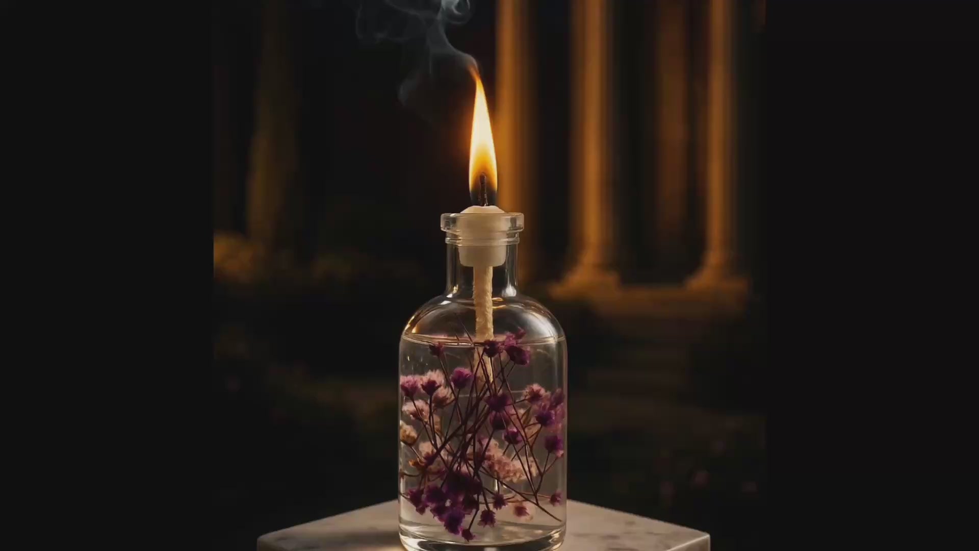 Load video: Slow zoom spin around a purple and white oil candle called Persephone